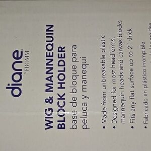 Wig and mannequin block holder.